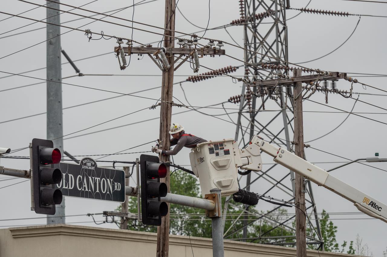 Lineworker making repairs at Old Canton Road in Jackson, Mississippi